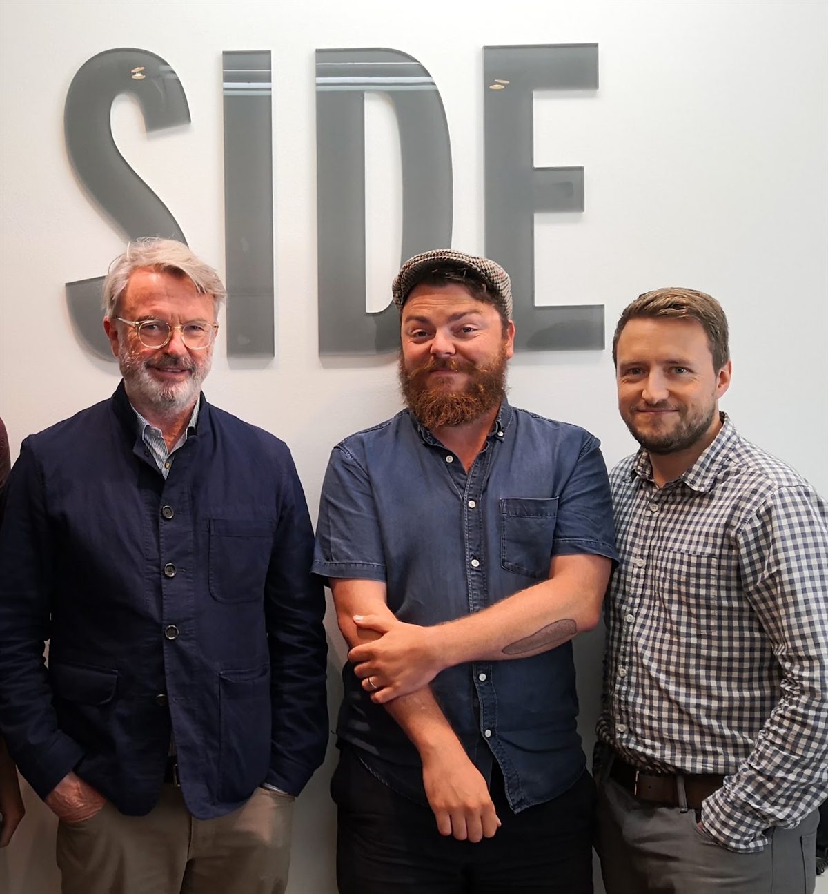 Sam Neill, an audio producer and Brendon Morgan at SIDE Studios in London